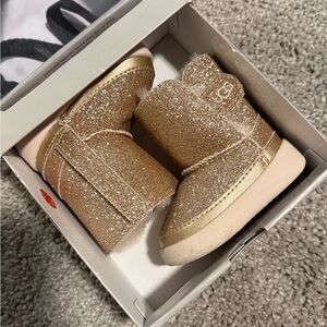 NIB! UGG Keelan Glitter Gold Baby Boots. Size 0/1 (0-6 months).